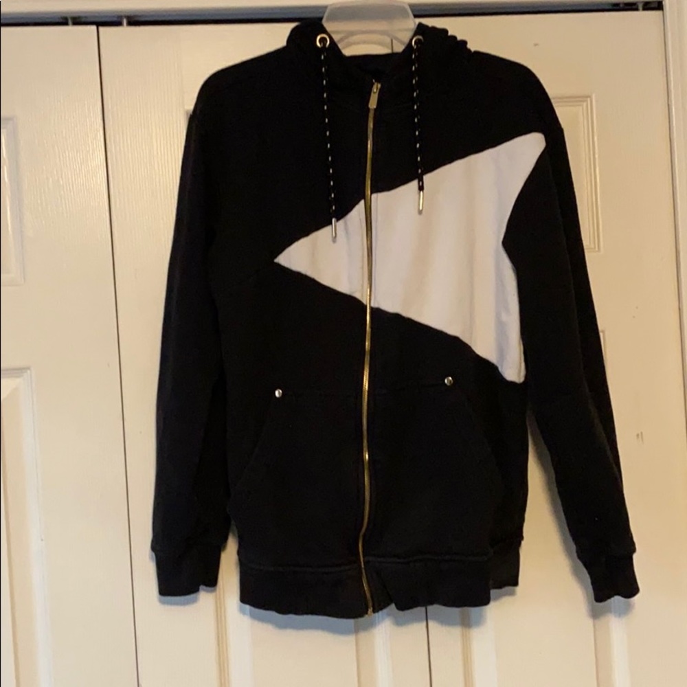 Black, white, and gold zip up jacket
